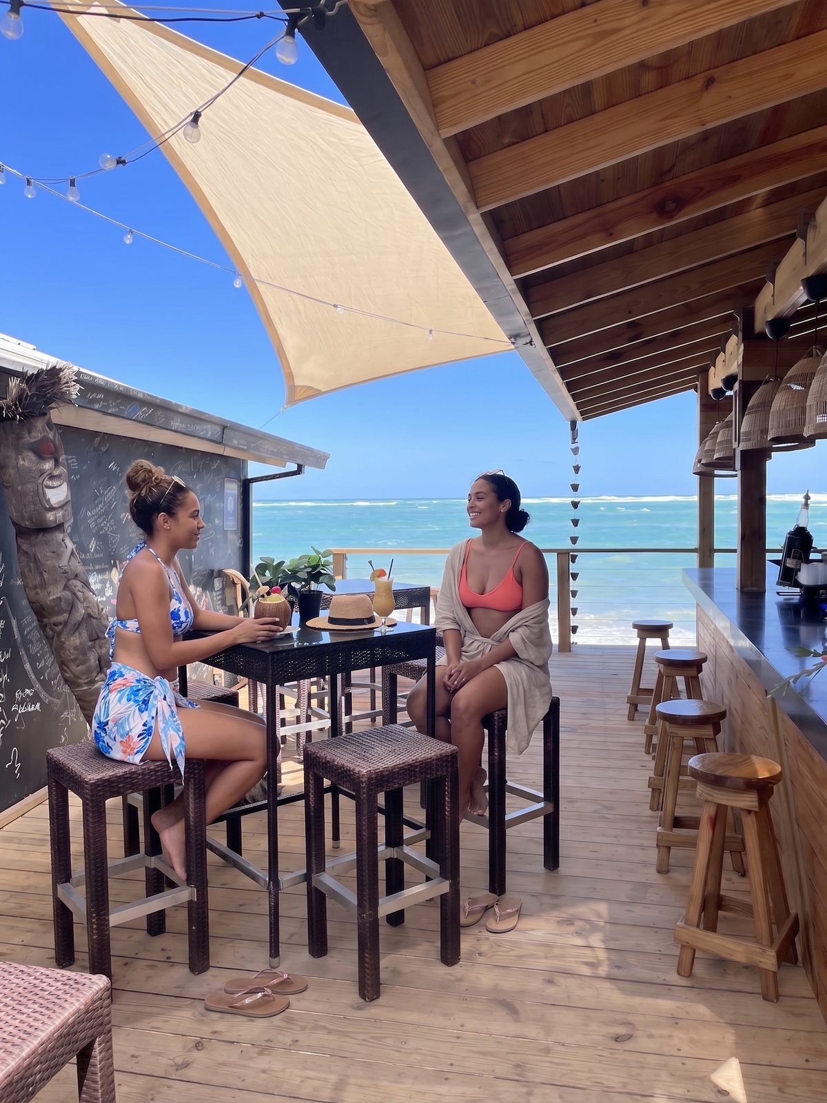 Beach bar deck overlooking turquoise water