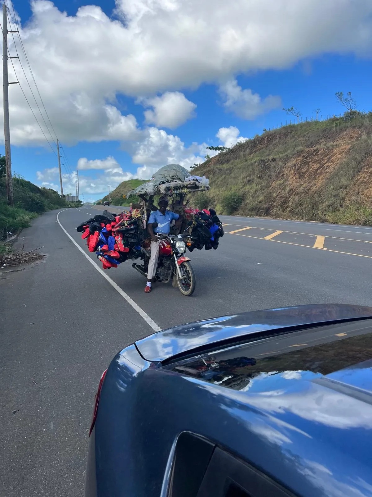 Local vendor on a motorcycle